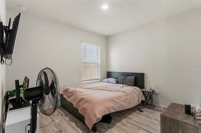9005 Tuscan Cypress St, Kissimmee, FL 34747 - bedroom with light wood-style floors