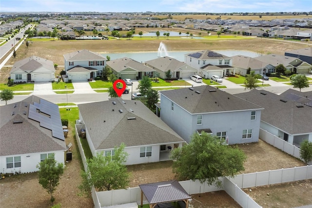 9005 Tuscan Cypress St, Kissimmee, FL 34747 - aerial perspective of suburban area with a large body of water