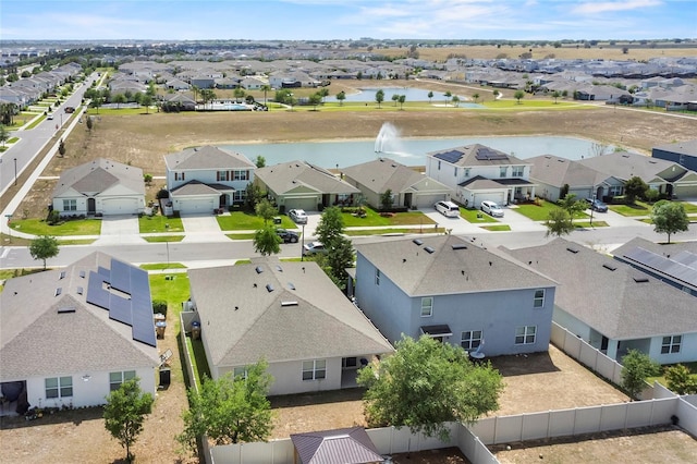 9005 Tuscan Cypress St, Kissimmee, FL 34747 - aerial view of residential area featuring a large body of water