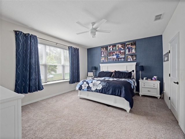 1151 Lakeside Estates Dr, Apopka, FL 32703 - bedroom with a ceiling fan, carpet floors, baseboards, and visible vents