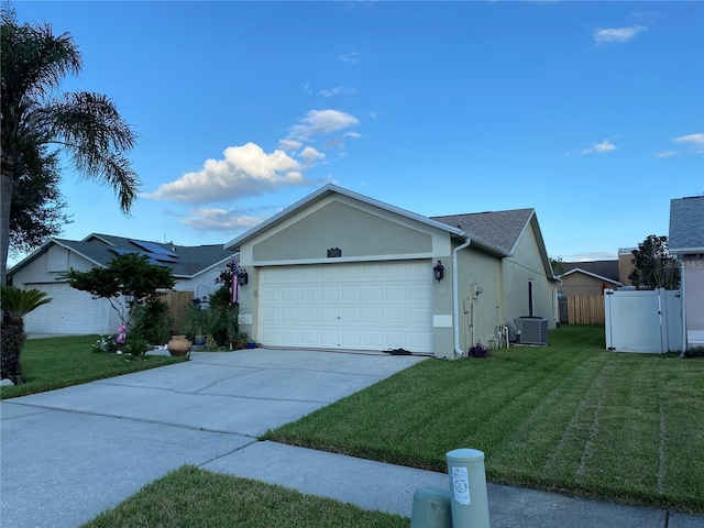 1210 Etchfield Cir, Brandon, FL 33511 - view of front facade featuring stucco siding, driveway, and an attached garage
