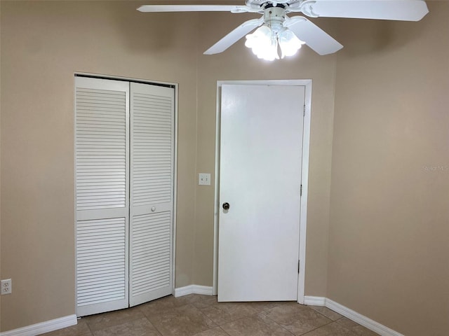 1210 Etchfield Cir, Brandon, FL 33511 - unfurnished bedroom with a closet, a ceiling fan, and tile patterned flooring