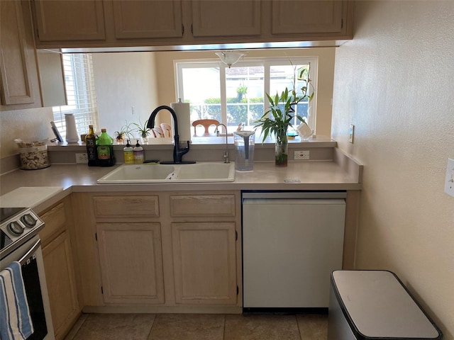 1210 Etchfield Cir, Brandon, FL 33511 - kitchen featuring dishwashing machine, stainless steel electric range, light countertops, light tile patterned floors, and a textured wall