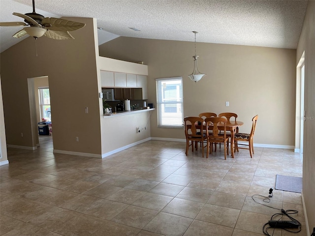 1210 Etchfield Cir, Brandon, FL 33511 - dining room with a ceiling fan, a textured ceiling, light tile patterned floors, and high vaulted ceiling