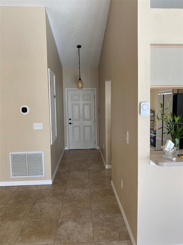 1210 Etchfield Cir, Brandon, FL 33511 - hallway with baseboards and lofted ceiling