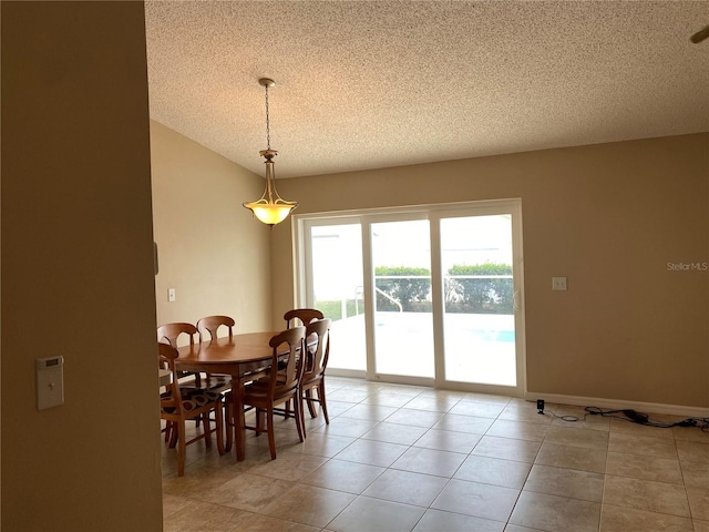 1210 Etchfield Cir, Brandon, FL 33511 - dining area featuring a textured ceiling and light tile patterned flooring