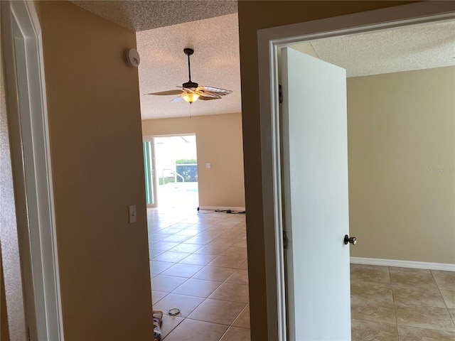 1210 Etchfield Cir, Brandon, FL 33511 - hallway featuring a textured ceiling and tile patterned floors