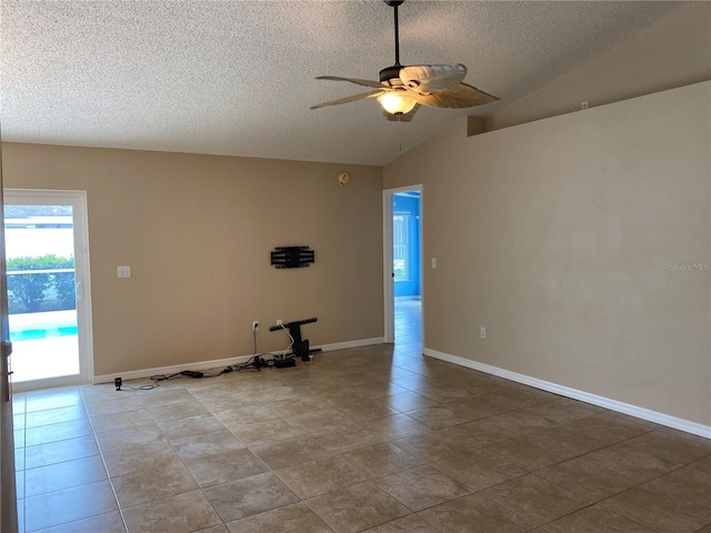 1210 Etchfield Cir, Brandon, FL 33511 - unfurnished room with a textured ceiling, a ceiling fan, vaulted ceiling, and light tile patterned floors