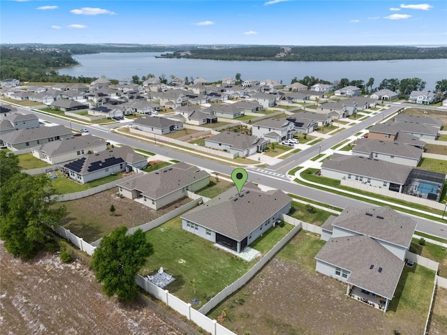 aerial view featuring a residential view and a water view