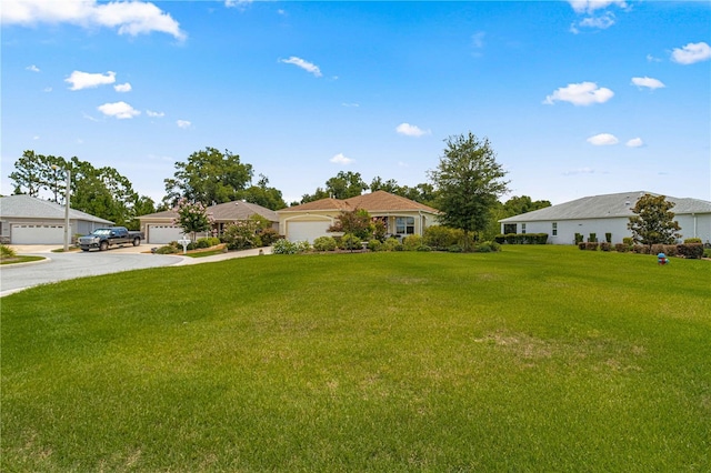 view of front of property with a residential view and a front lawn