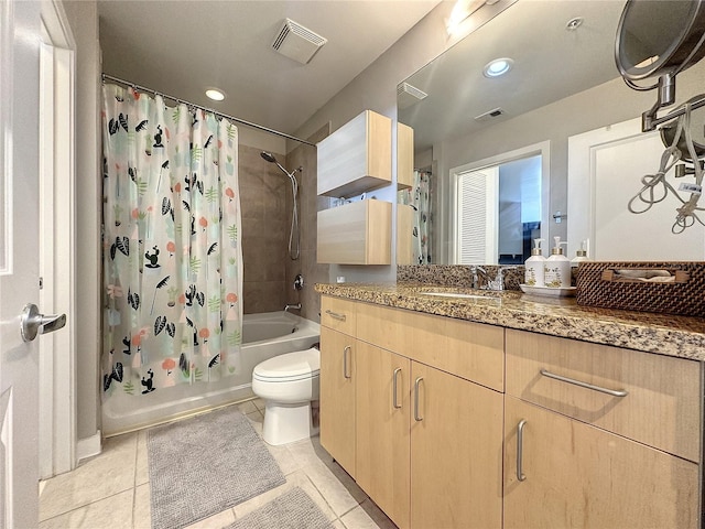 full bath with visible vents, shower / bath combination with curtain, tile patterned floors, and vanity