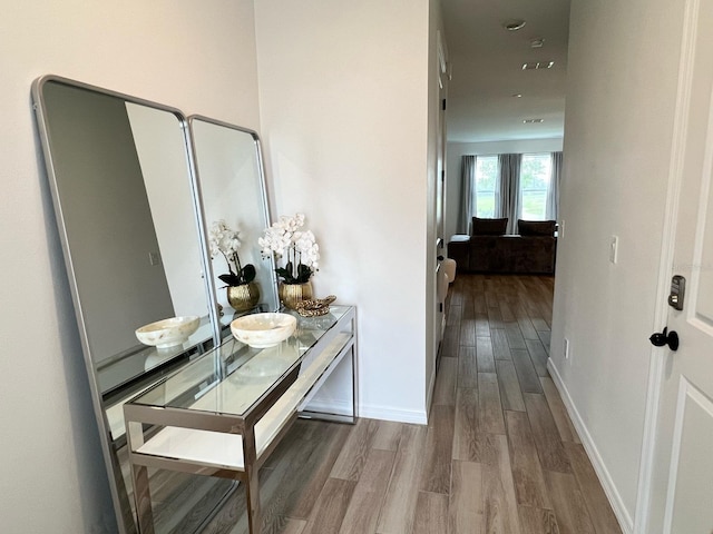 832 Benoi Dr, Davenport, FL 33896 - hallway with baseboards and wood finished floors