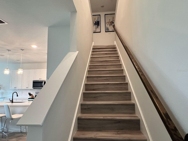 832 Benoi Dr, Davenport, FL 33896 - stairs with wood finished floors