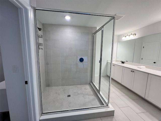 832 Benoi Dr, Davenport, FL 33896 - bathroom with tile patterned flooring, vanity, and a stall shower