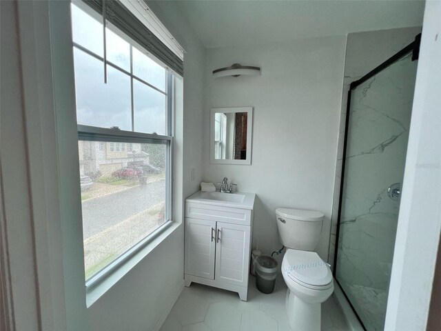 832 Benoi Dr, Davenport, FL 33896 - bathroom featuring toilet, vanity, and a marble finish shower