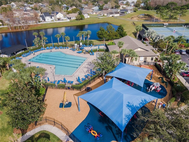 aerial view with a residential view and a water view