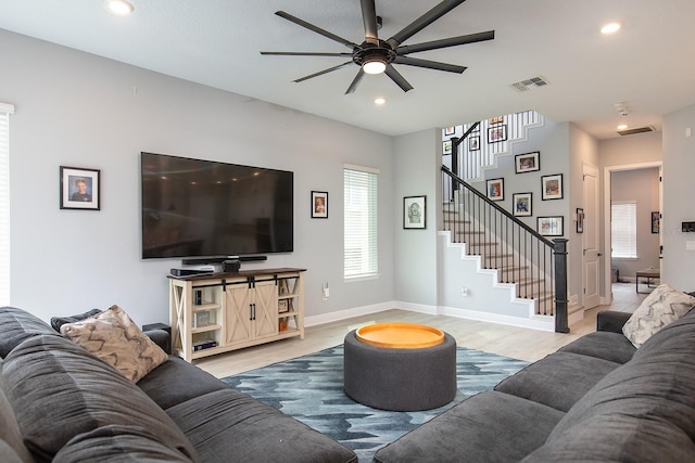 living room with recessed lighting, stairway, ceiling fan, and wood finished floors
