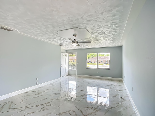 123 Shenandoah Ave, Lady Lake, FL 32159 - empty room featuring a ceiling fan, marble finish floor, baseboards, and visible vents