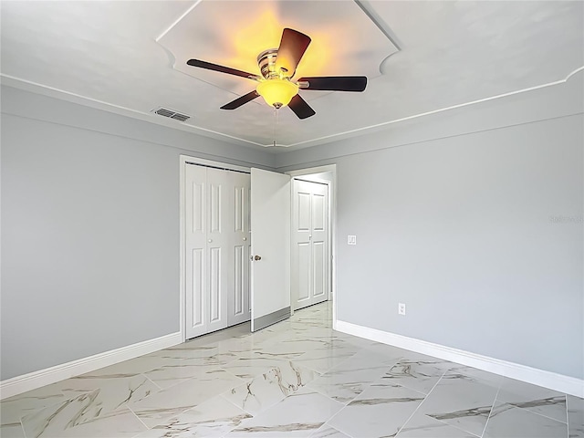 123 Shenandoah Ave, Lady Lake, FL 32159 - unfurnished room with marble finish floor, baseboards, visible vents, and ceiling fan