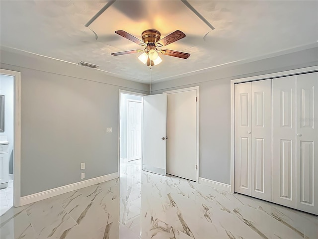 123 Shenandoah Ave, Lady Lake, FL 32159 - unfurnished bedroom featuring baseboards, marble finish floor, ceiling fan, and visible vents