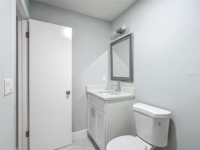 123 Shenandoah Ave, Lady Lake, FL 32159 - half bath featuring marble finish floor, toilet, vanity, and baseboards