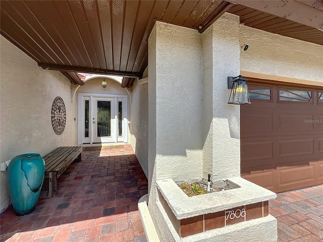 7808 The Esplanade Ct, Orlando, FL 32836 - entrance to property featuring stucco siding and a garage