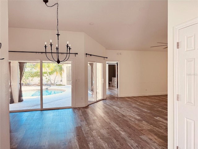 7808 The Esplanade Ct, Orlando, FL 32836 - unfurnished room with a chandelier, wood finished floors, and lofted ceiling
