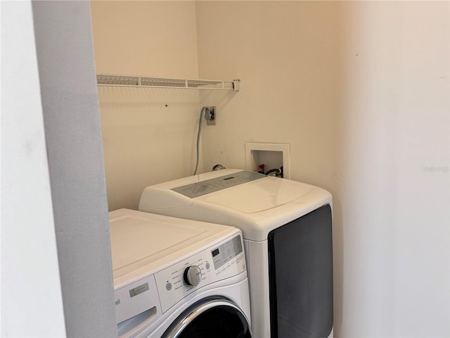 7808 The Esplanade Ct, Orlando, FL 32836 - washroom featuring independent washer and dryer