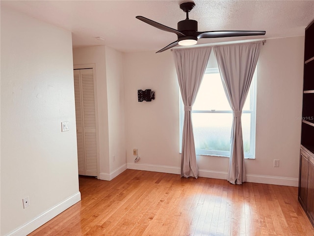 7808 The Esplanade Ct, Orlando, FL 32836 - unfurnished room with ceiling fan and light wood-style flooring