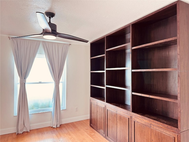 7808 The Esplanade Ct, Orlando, FL 32836 - detailed view of wood finished floors, a textured ceiling, and ceiling fan