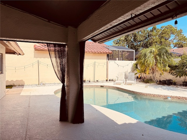 7808 The Esplanade Ct, Orlando, FL 32836 - view of pool with a fenced backyard and a patio
