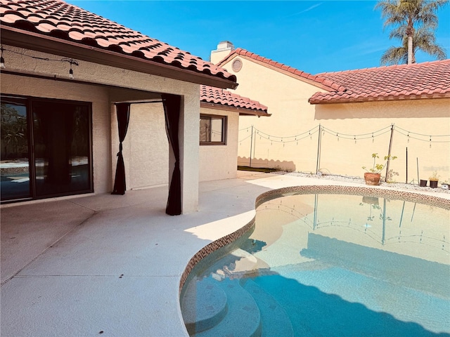 7808 The Esplanade Ct, Orlando, FL 32836 - swimming pool with a patio area