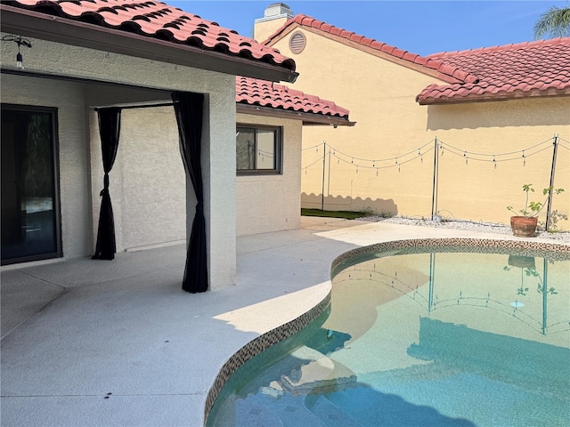 7808 The Esplanade Ct, Orlando, FL 32836 - outdoor pool with a patio area