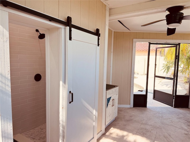 7808 The Esplanade Ct, Orlando, FL 32836 - full bath featuring a stall shower, ceiling fan, and wood walls