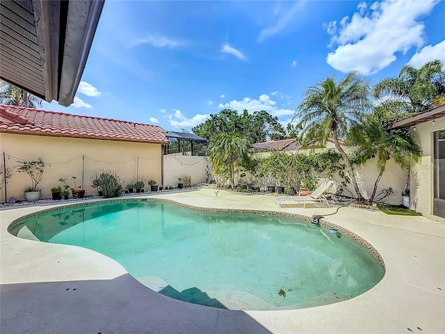 7808 The Esplanade Ct, Orlando, FL 32836 - view of swimming pool with a patio and a fenced backyard