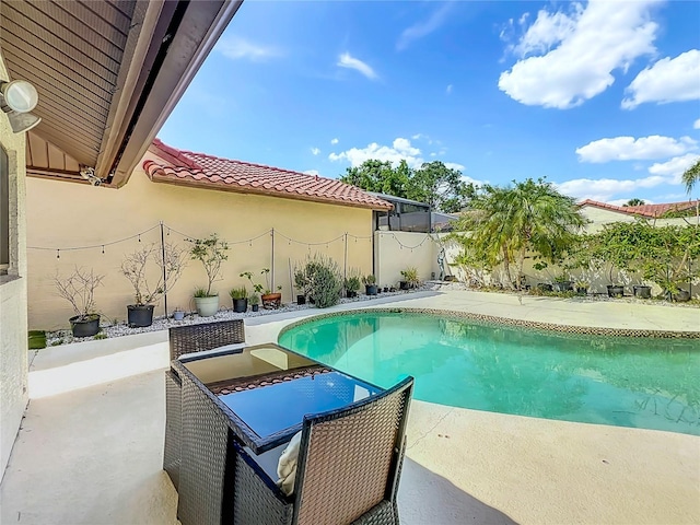 7808 The Esplanade Ct, Orlando, FL 32836 - view of swimming pool with a fenced backyard and a patio area