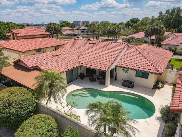 7808 The Esplanade Ct, Orlando, FL 32836 - view of swimming pool featuring a fenced backyard, a patio area, and outdoor lounge area