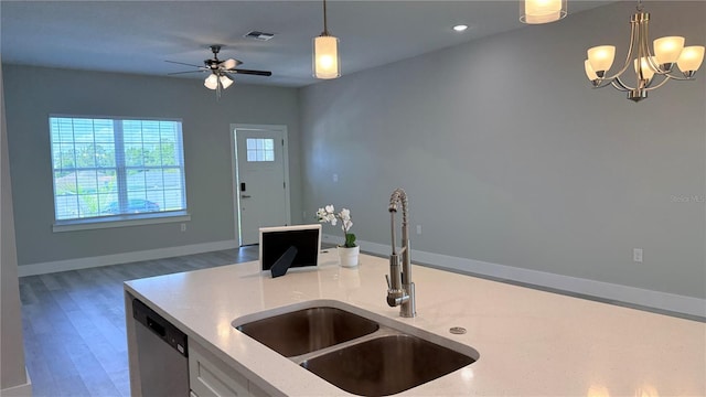 6345 SW 155th Pl, Ocala, FL 34473 - kitchen featuring a sink, dishwasher, plenty of natural light, light stone counters, and recessed lighting
