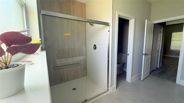 6345 SW 155th Pl, Ocala, FL 34473 - bathroom with a shower stall and toilet