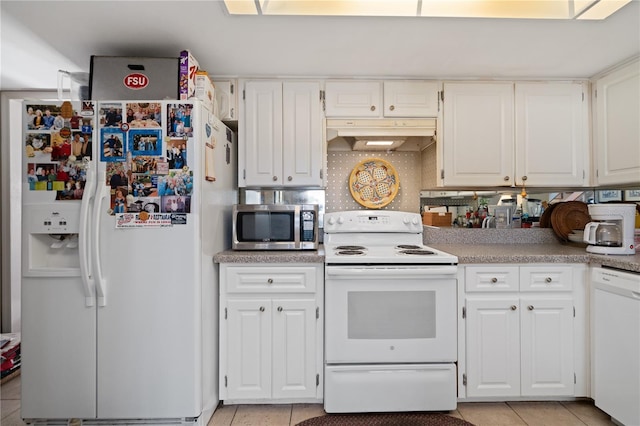 908 Hillary Ct Unit 15, Orlando, FL 32804 - kitchen featuring under cabinet range hood, light tile patterned floors, light countertops, and white appliances