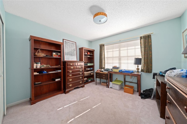 908 Hillary Ct Unit 15, Orlando, FL 32804 - carpeted home office featuring a textured ceiling