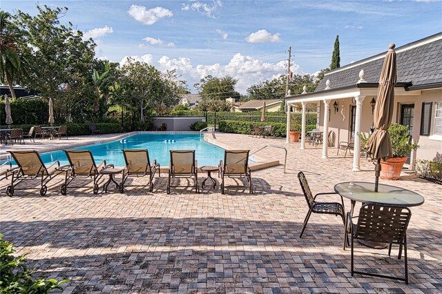 908 Hillary Ct Unit 15, Orlando, FL 32804 - pool with a patio and fence