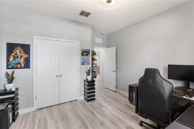 3936 Parkhouse Dr, Orlando, FL 32824 - home office featuring baseboards, visible vents, and light wood-style floors