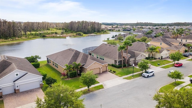 3936 Parkhouse Dr, Orlando, FL 32824 - aerial view featuring a residential view and a water view