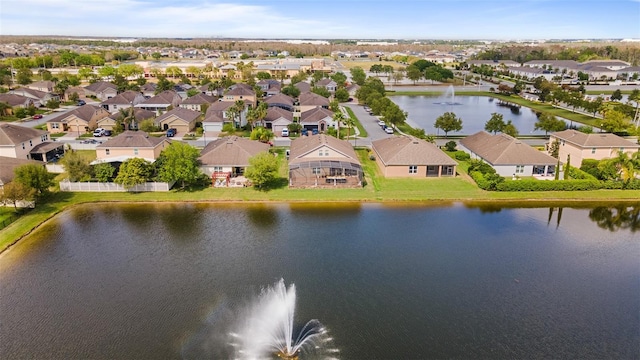 3936 Parkhouse Dr, Orlando, FL 32824 - drone / aerial view with a water view and a residential view
