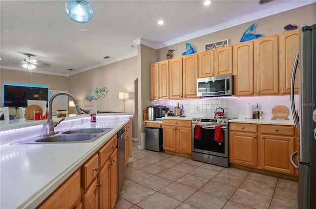 625 Waterland Ct, Orlando, FL 32828 - kitchen featuring light countertops, ornamental molding, stainless steel appliances, decorative backsplash, and a sink