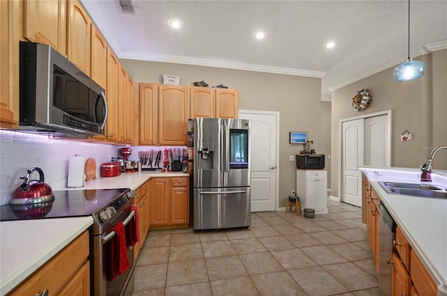 625 Waterland Ct, Orlando, FL 32828 - kitchen with light countertops, visible vents, crown molding, stainless steel appliances, and a sink