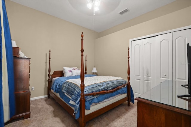 625 Waterland Ct, Orlando, FL 32828 - bedroom featuring a closet, a ceiling fan, baseboards, light colored carpet, and visible vents