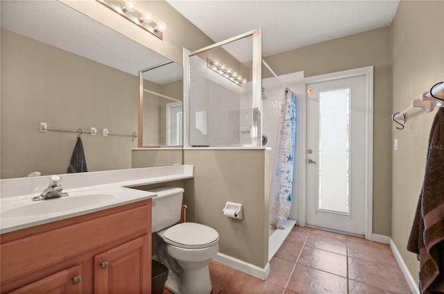 625 Waterland Ct, Orlando, FL 32828 - full bathroom with a shower with curtain, baseboards, toilet, and vanity