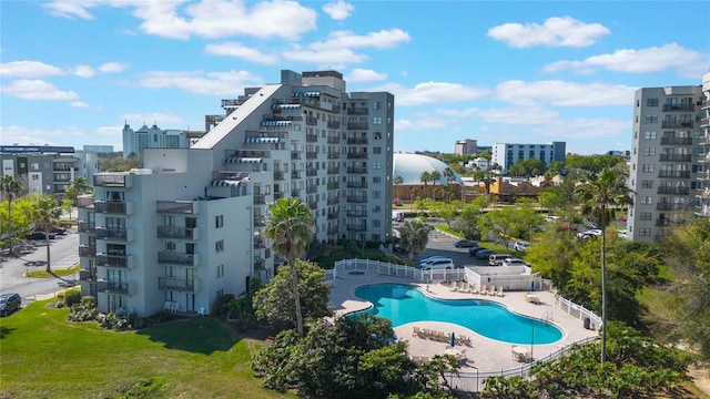 6165 Carrier Dr Unit 2001, Orlando, FL 32819 - view of building exterior with a city view and a community pool